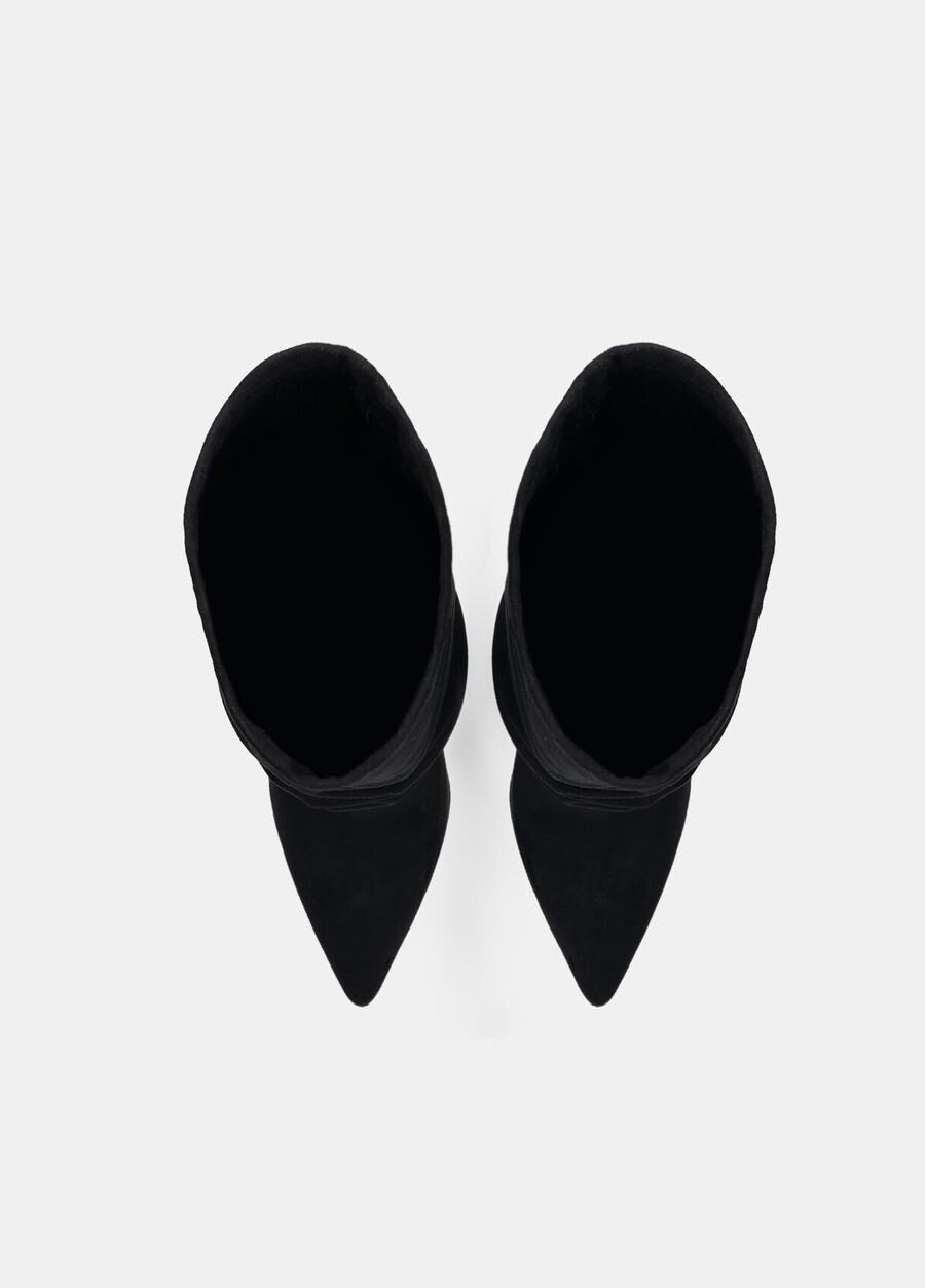 knee-high boots with decorative buckle