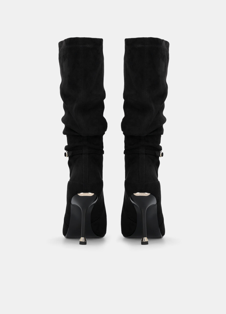 knee-high boots with decorative buckle