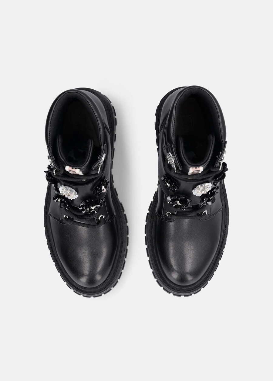 combat boots with bejewelled appliqués