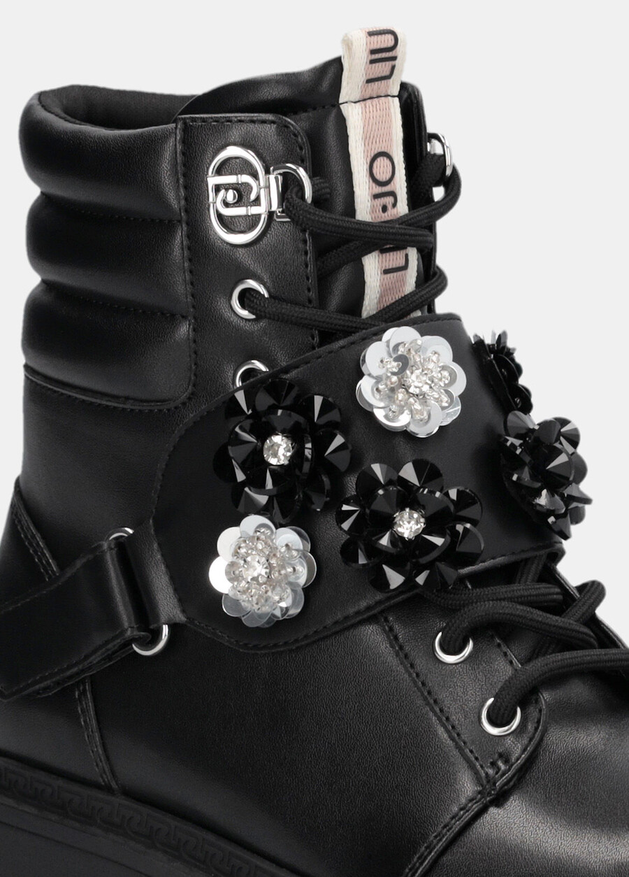 combat boots with bejewelled appliqués
