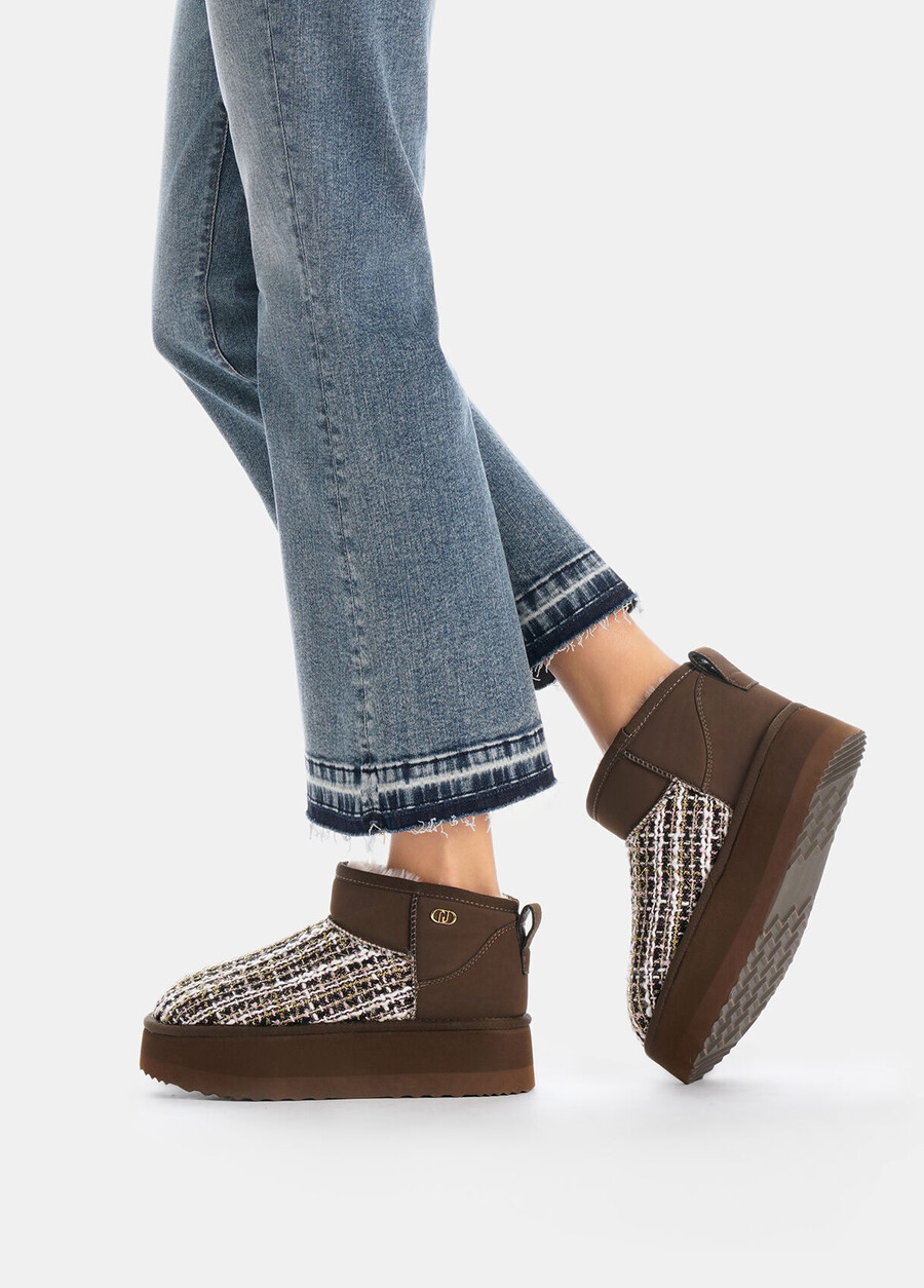 warm ankle boots with bouclé detailing