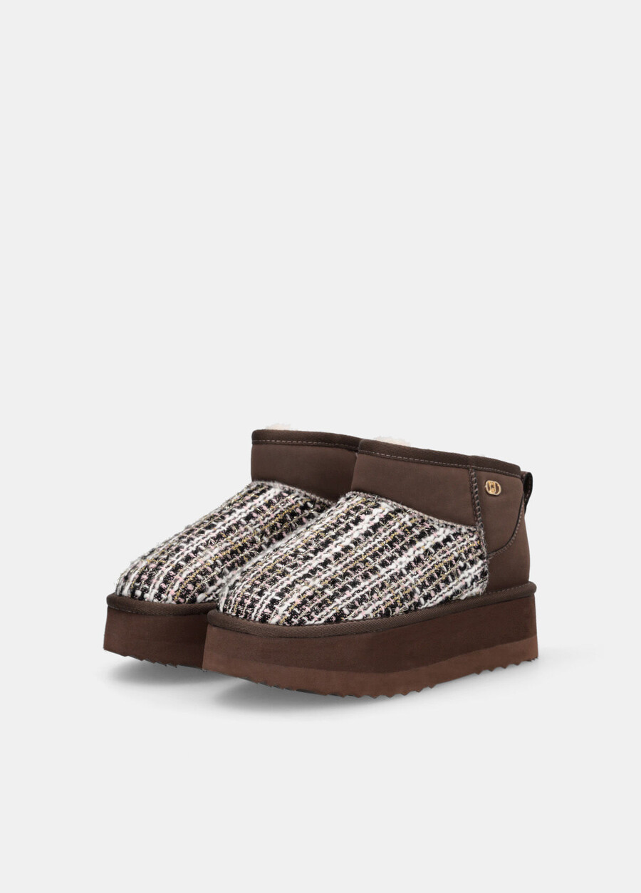 warm ankle boots with bouclé detailing