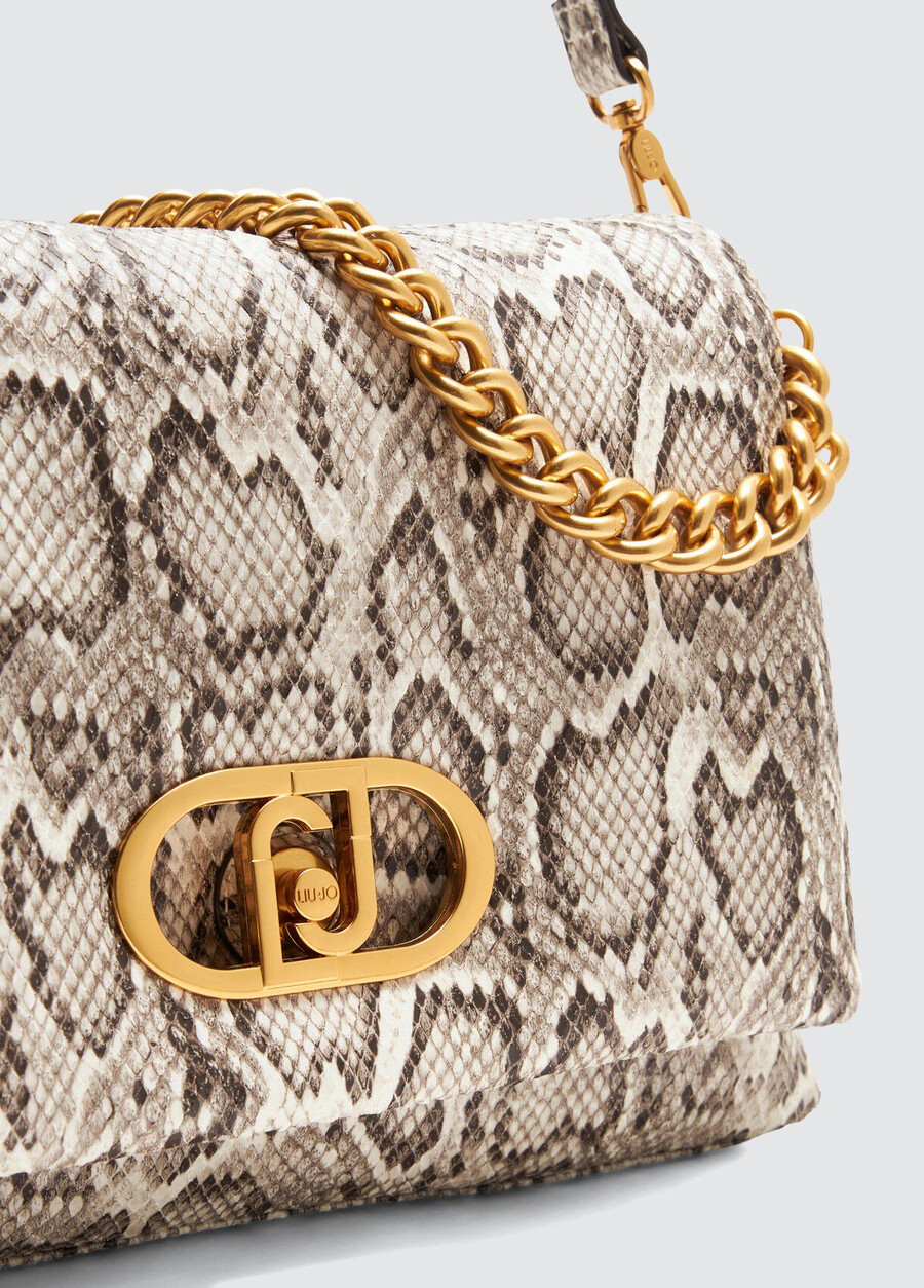 large snakeskin lapuffy bag