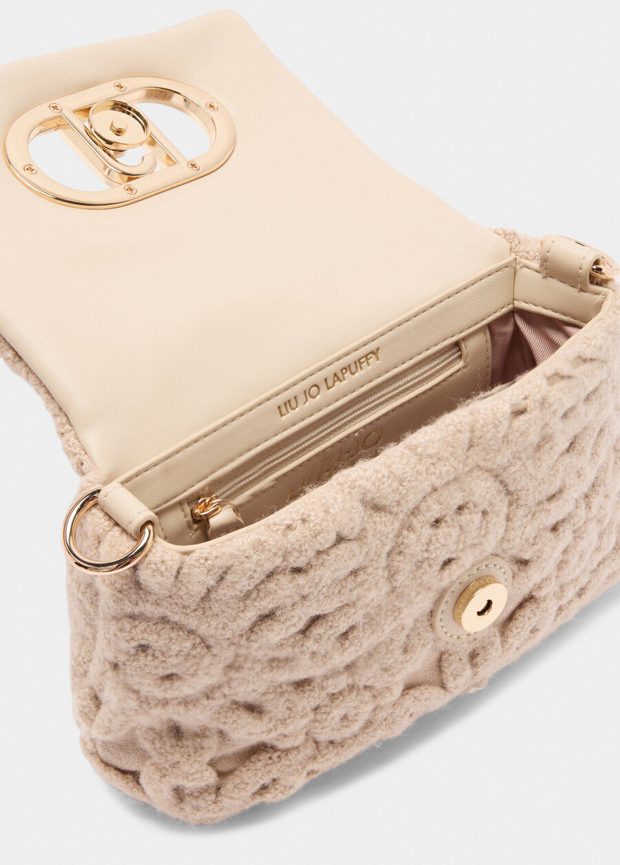 small lapuffy bag with embroidery