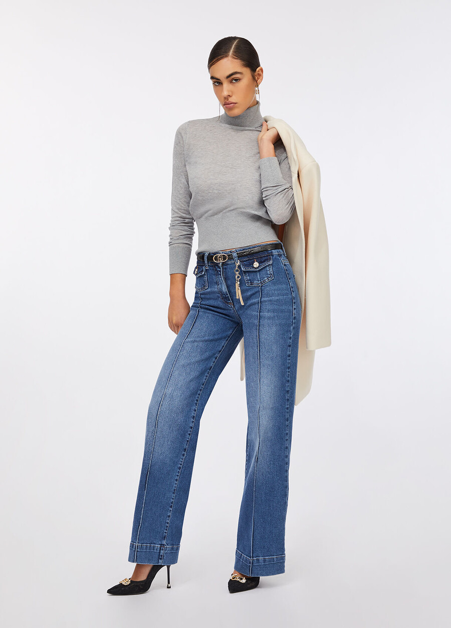 flare jeans with jewelled charm