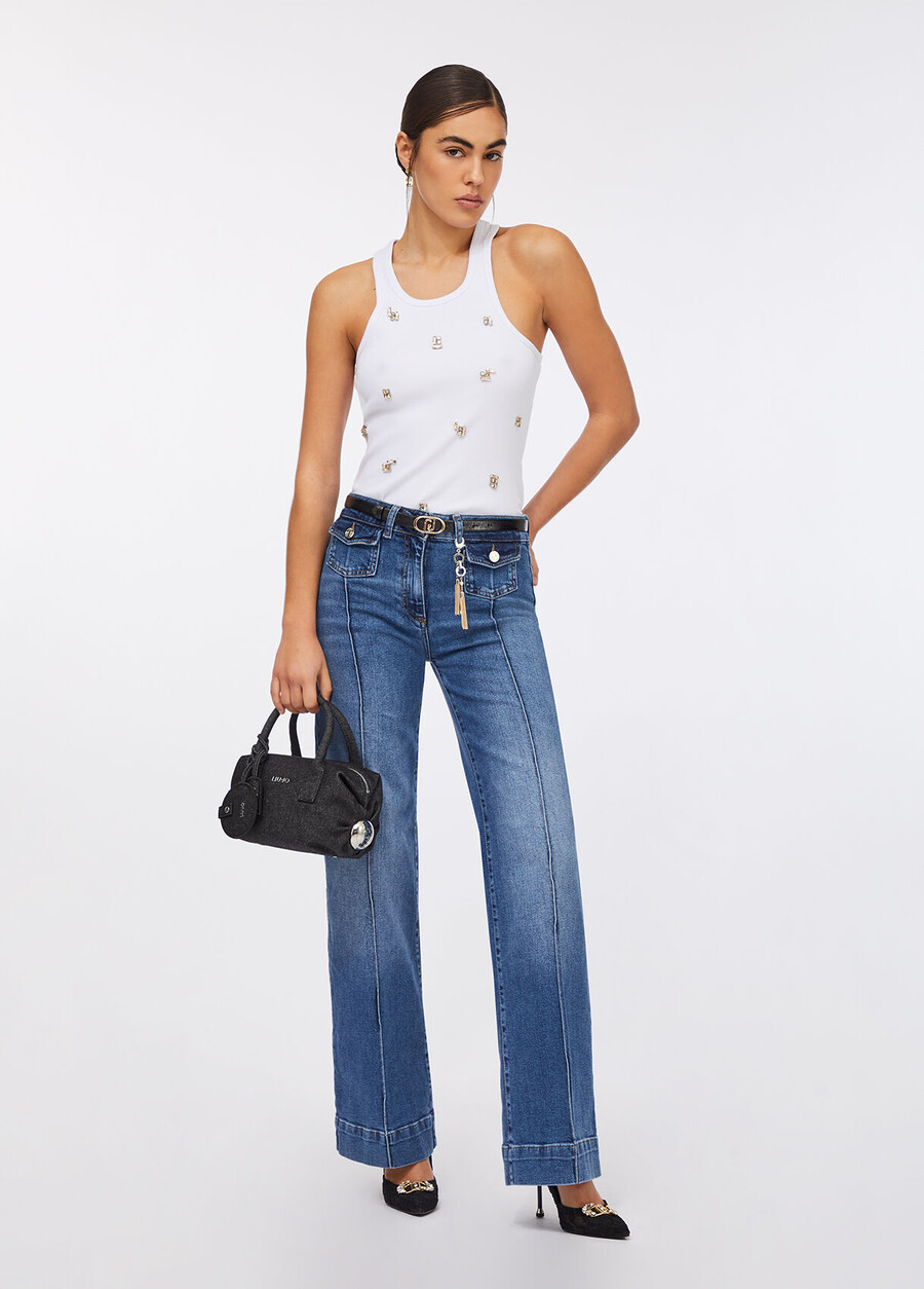 flare jeans with jewelled charm