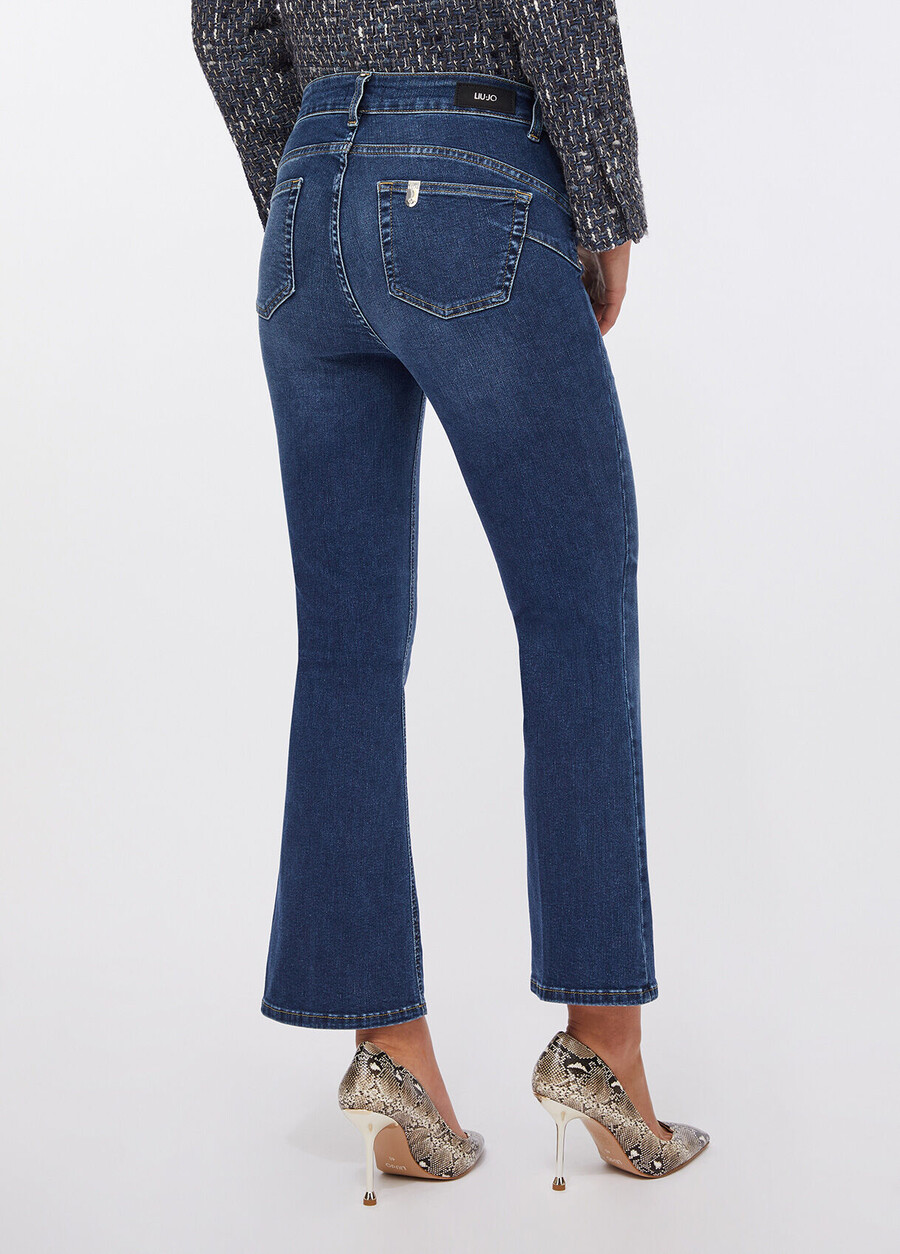 flare jeans with jewelled buttons