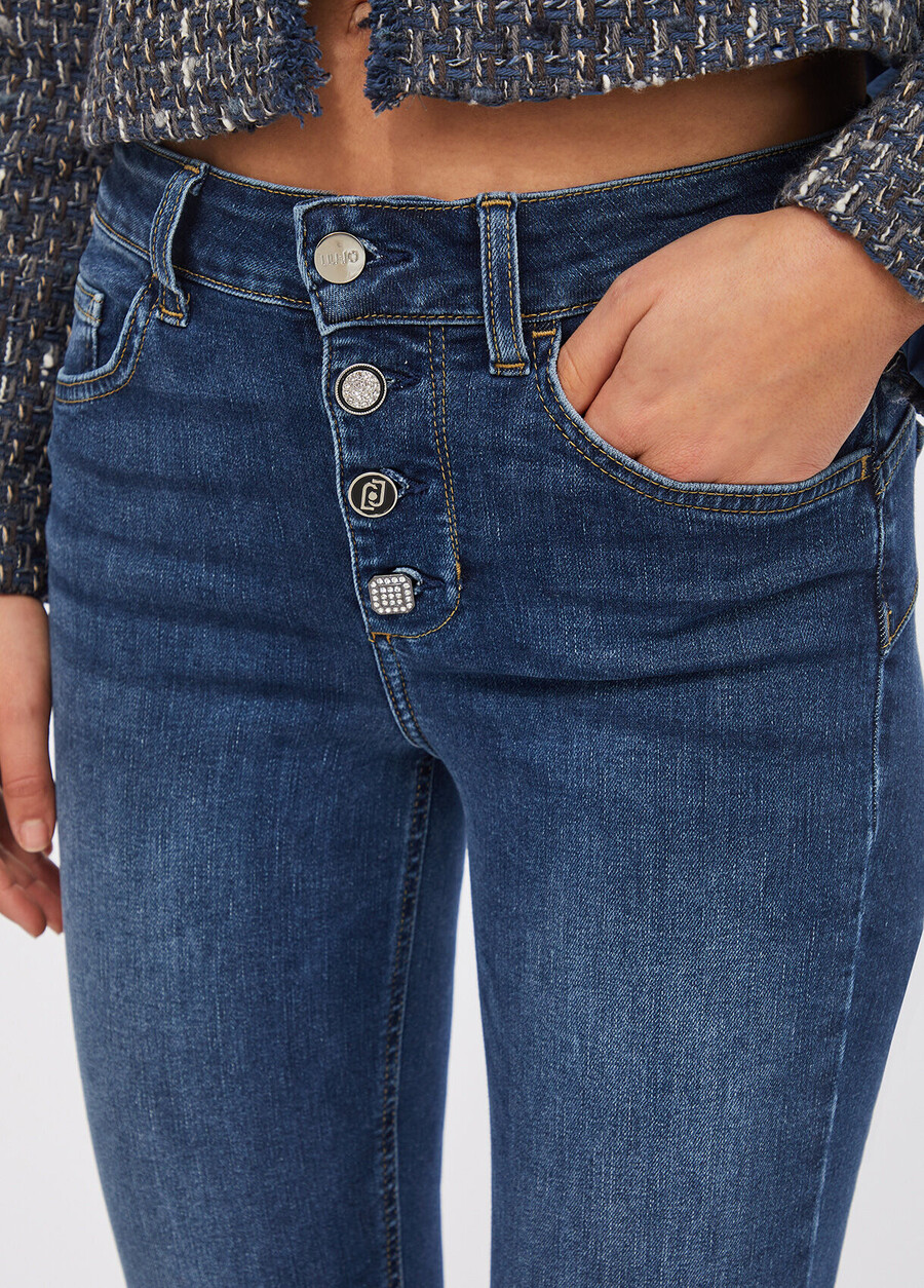 flare jeans with jewelled buttons