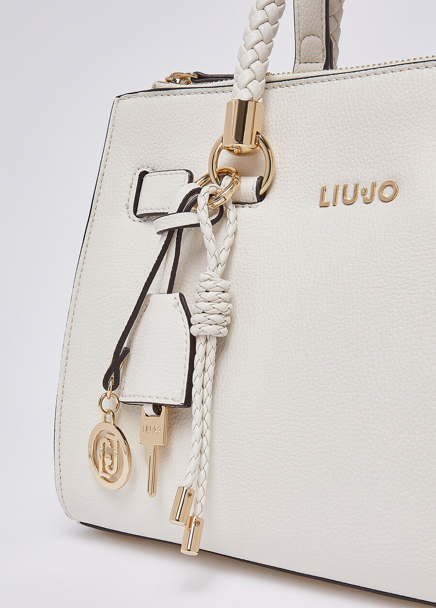 small satchel bag with charms