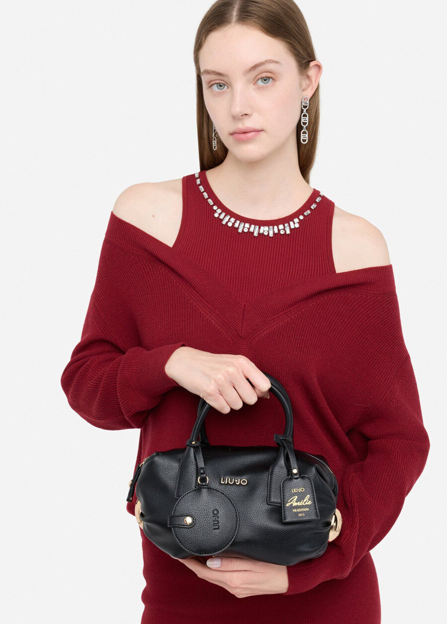 small bag with charm