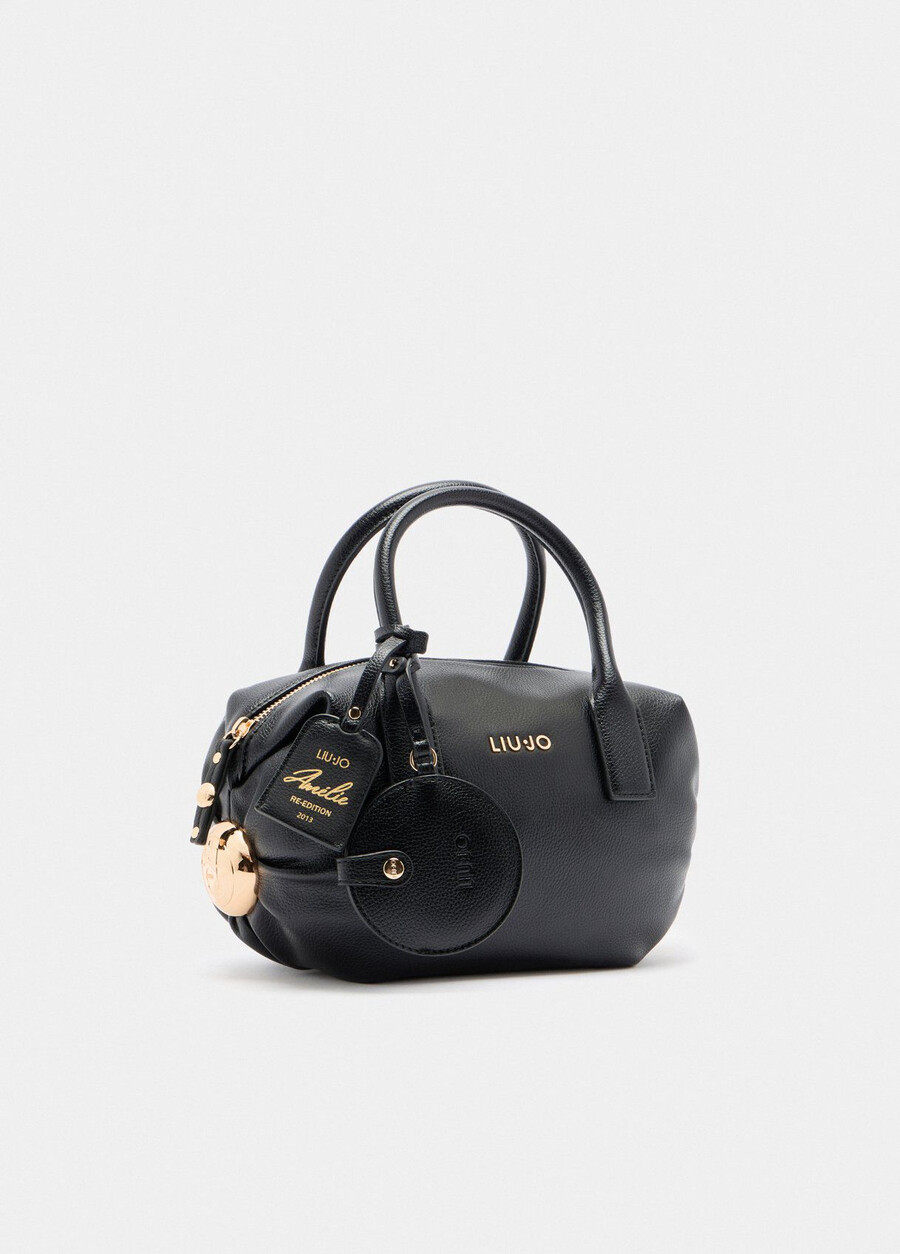 small bag with charm