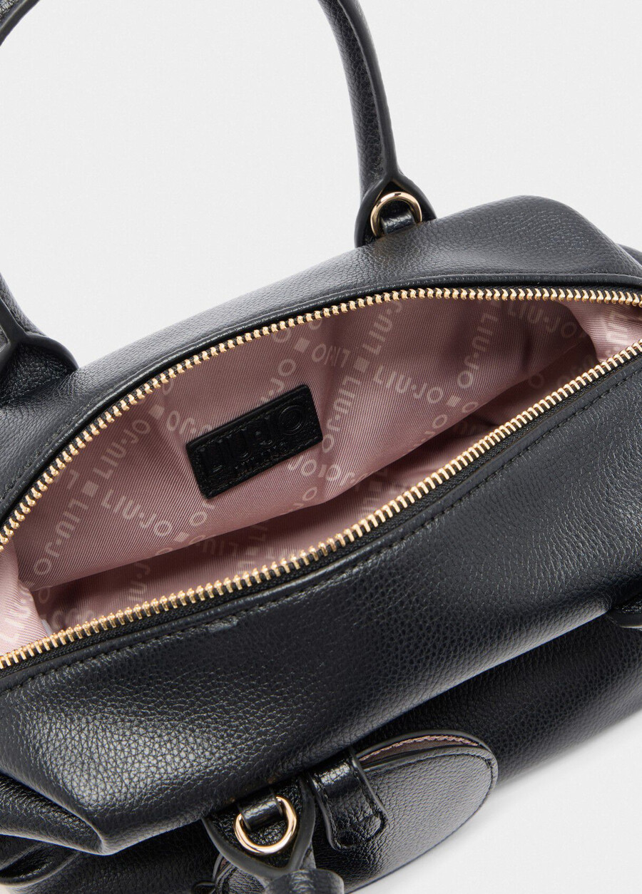 small bag with charm