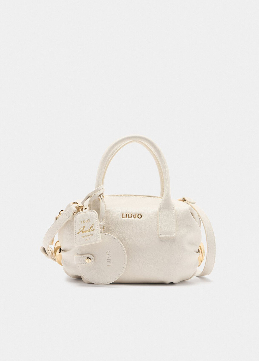 small bag with charm