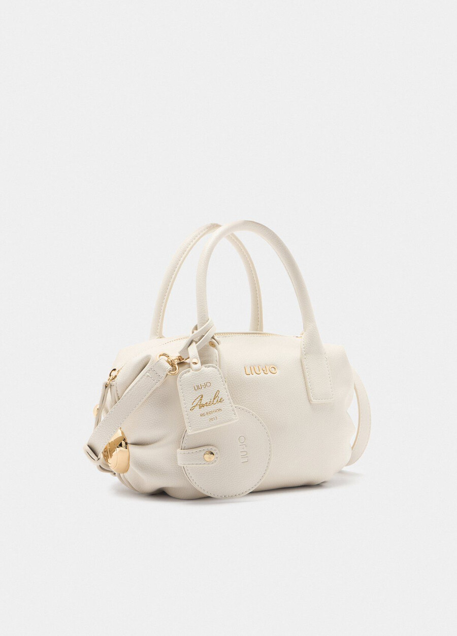 small bag with charm
