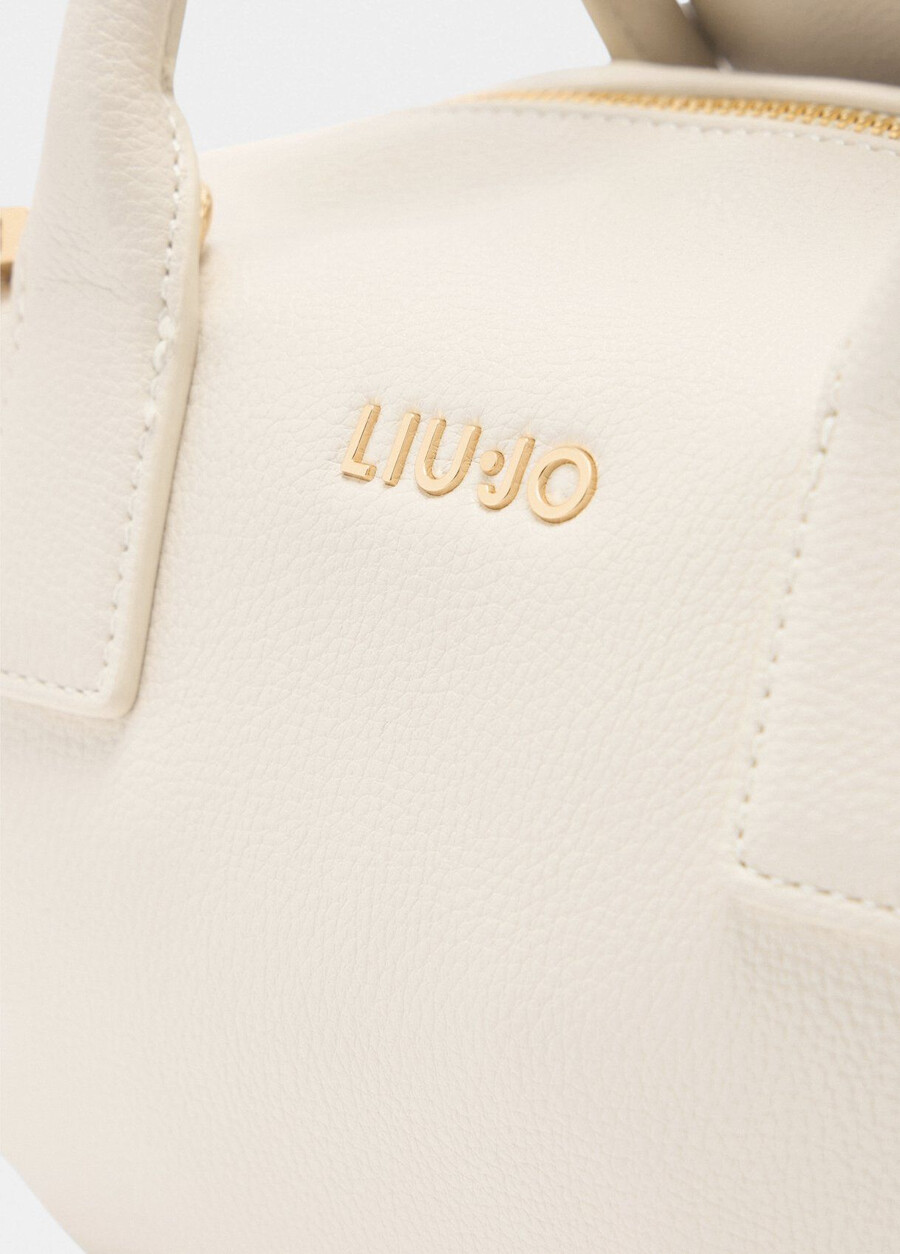 small bag with charm