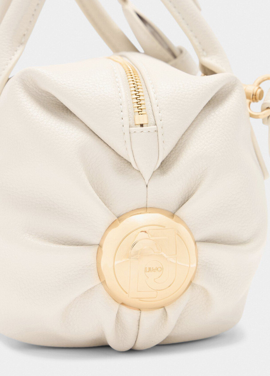 small bag with charm