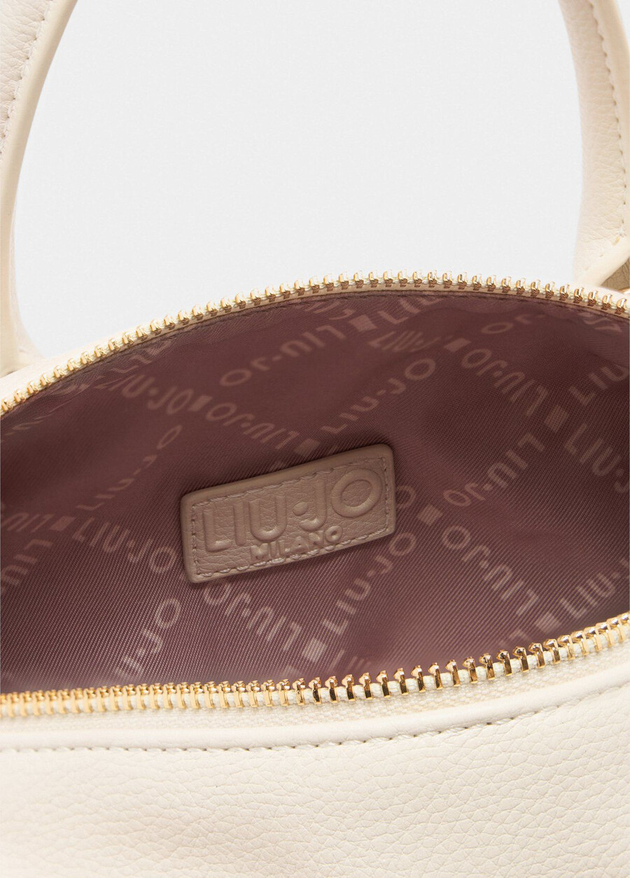 small bag with charm