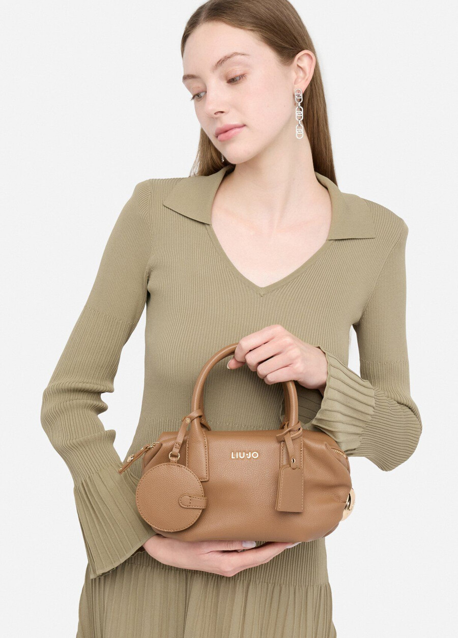 small bag with charm