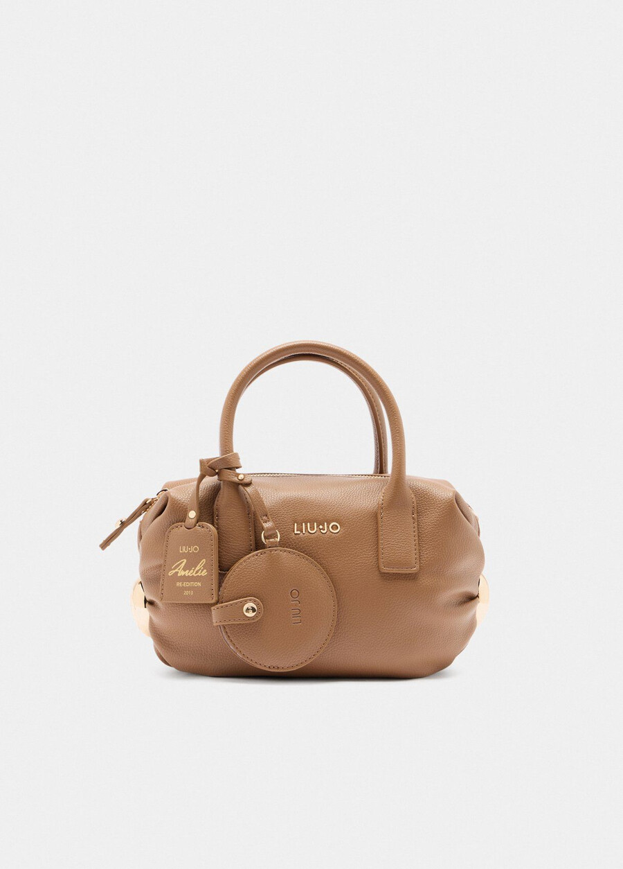 small bag with charm