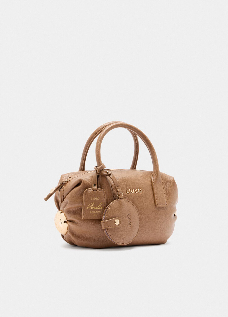 small bag with charm