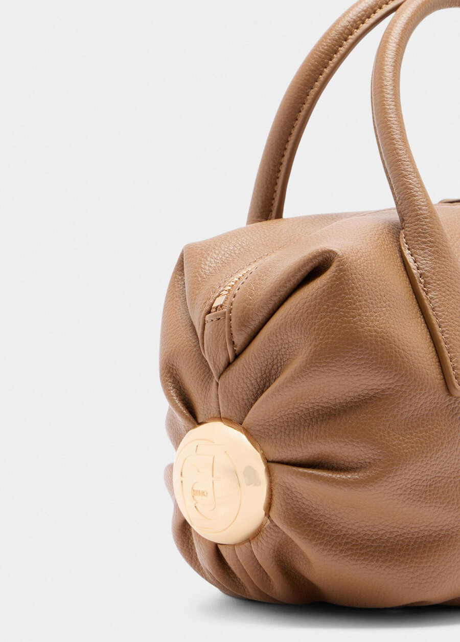 small bag with charm