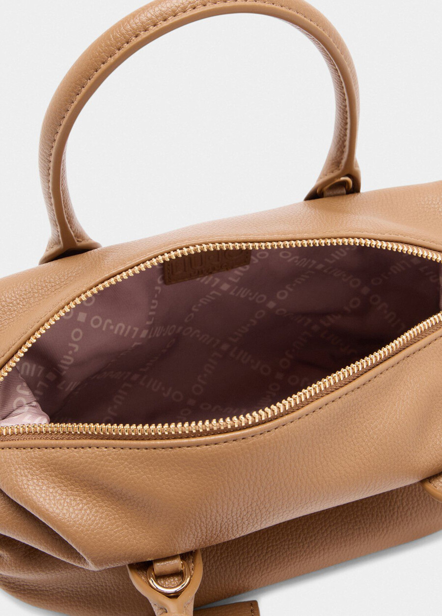 small bag with charm