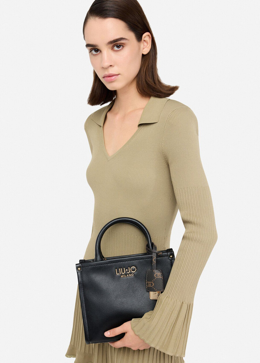 small bag with charm