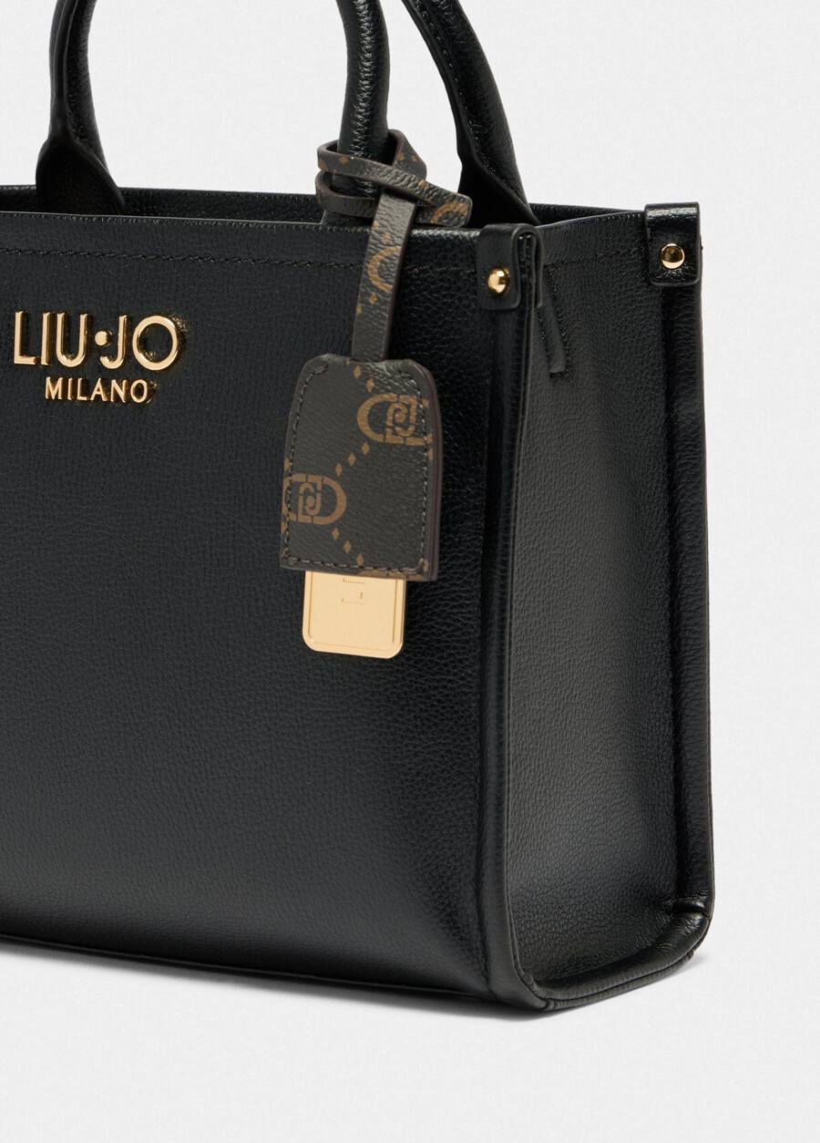 small bag with charm