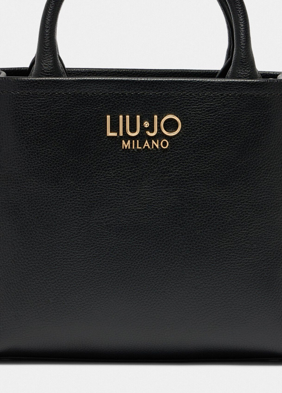 small bag with charm