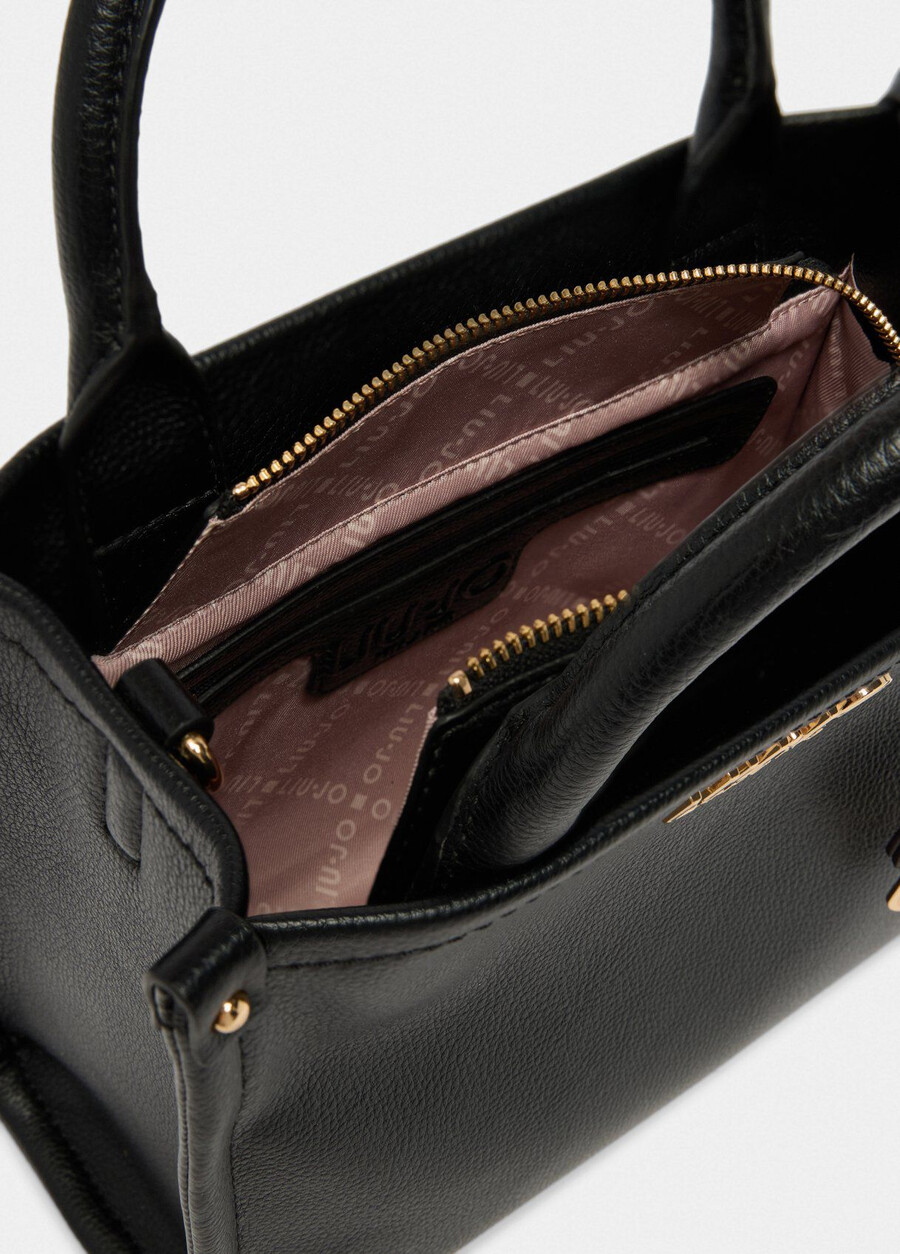 small bag with charm