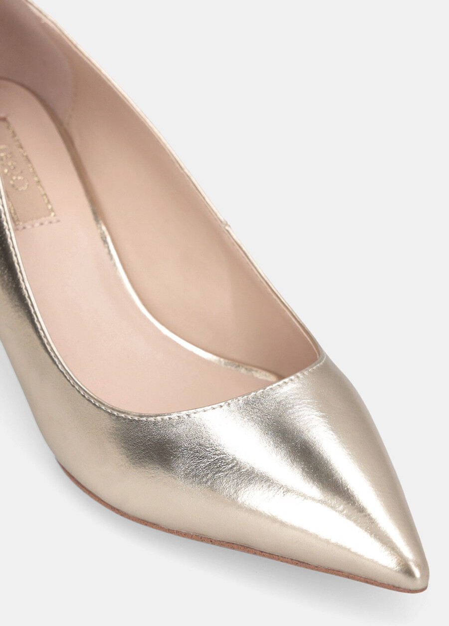 low-heeled metallic court shoes
