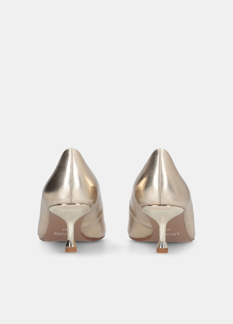 low-heeled metallic court shoes