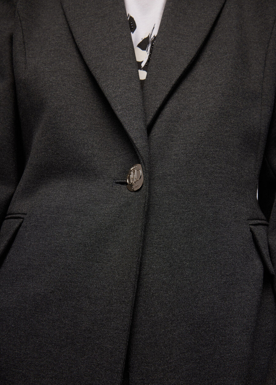 blazer with brooch detail