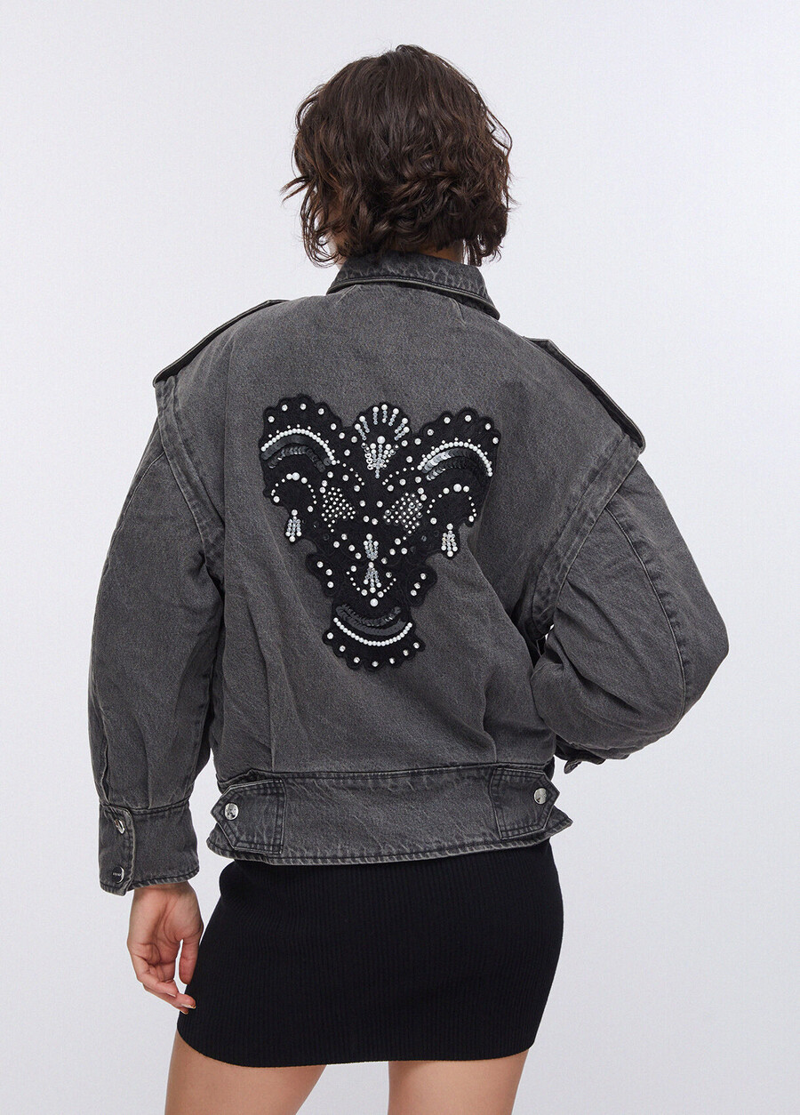 denim jacket with embroidery on the back