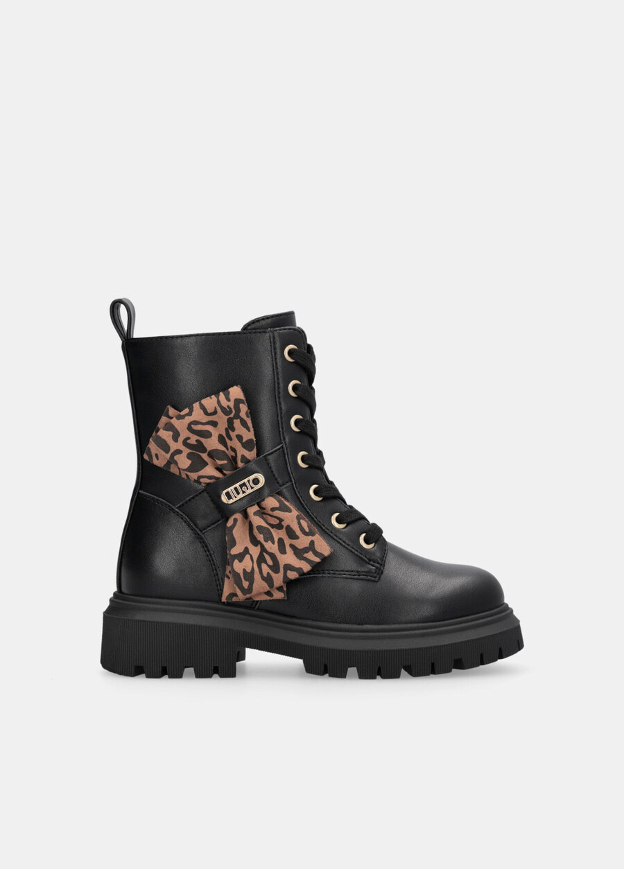 combat boots with animal-print bow