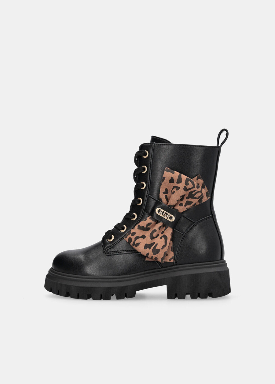 combat boots with animal-print bow