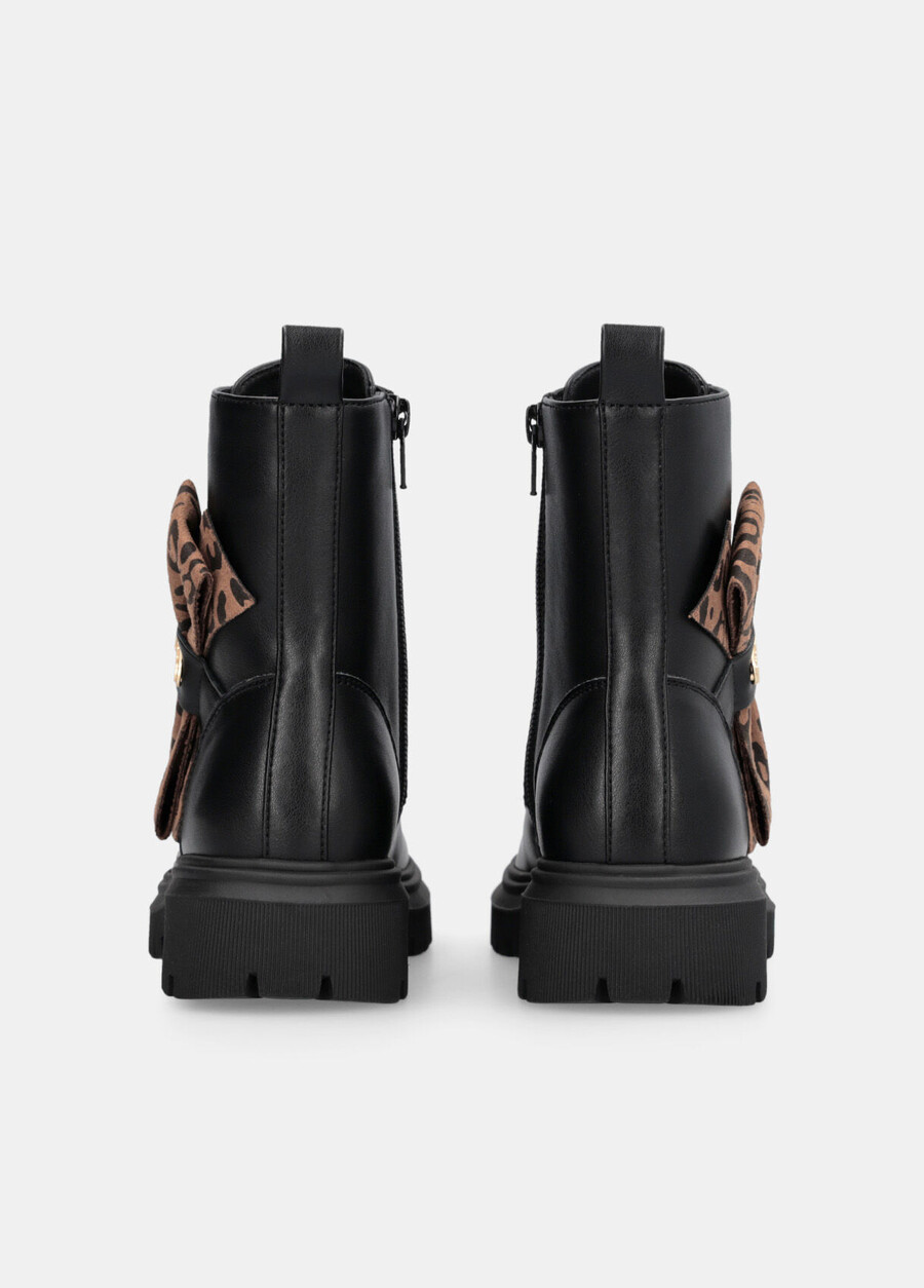 combat boots with animal-print bow