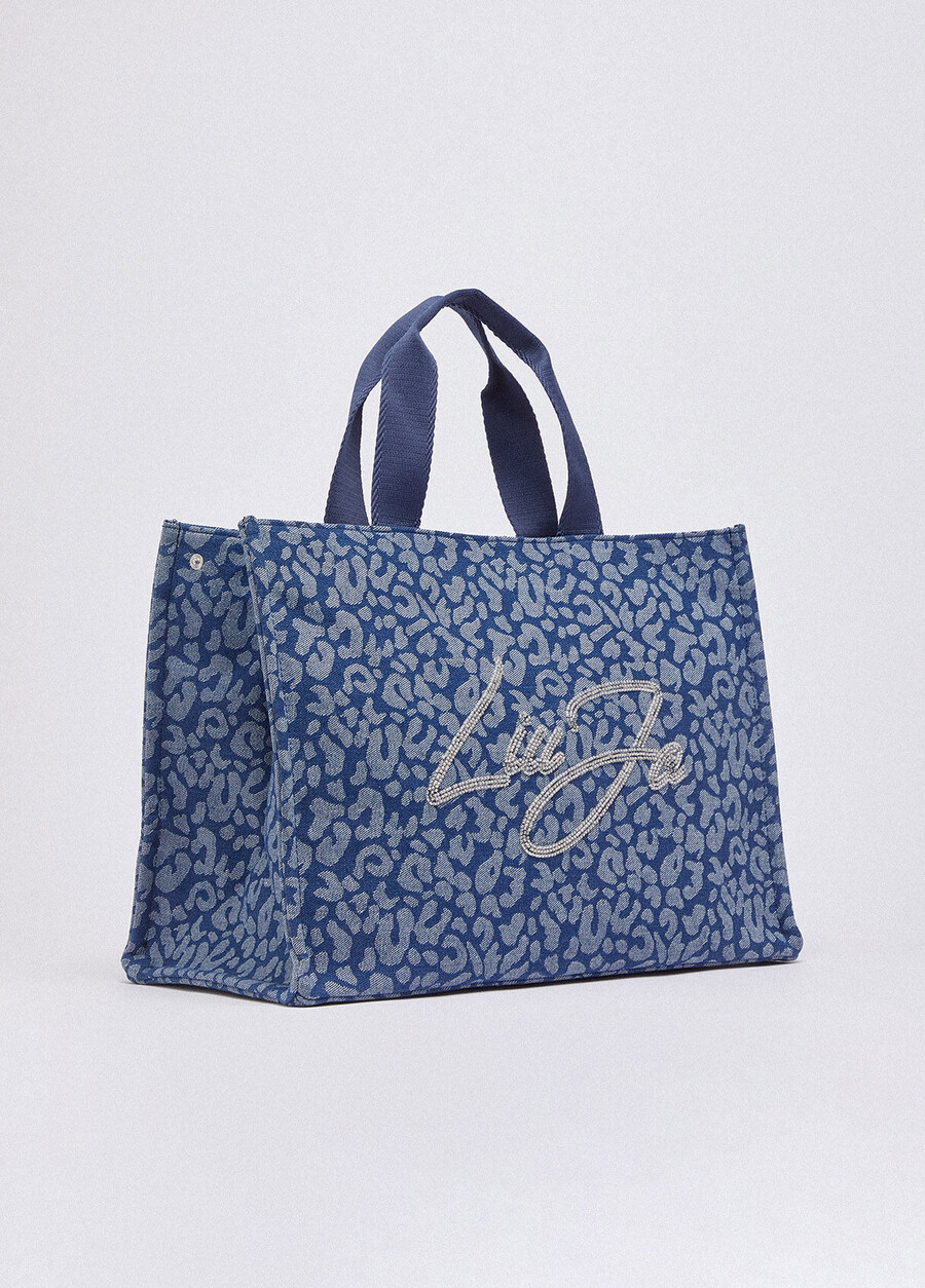 large animal-print denim tote bag