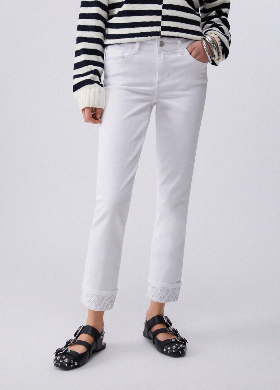 skinny trousers with turnups and gemstones