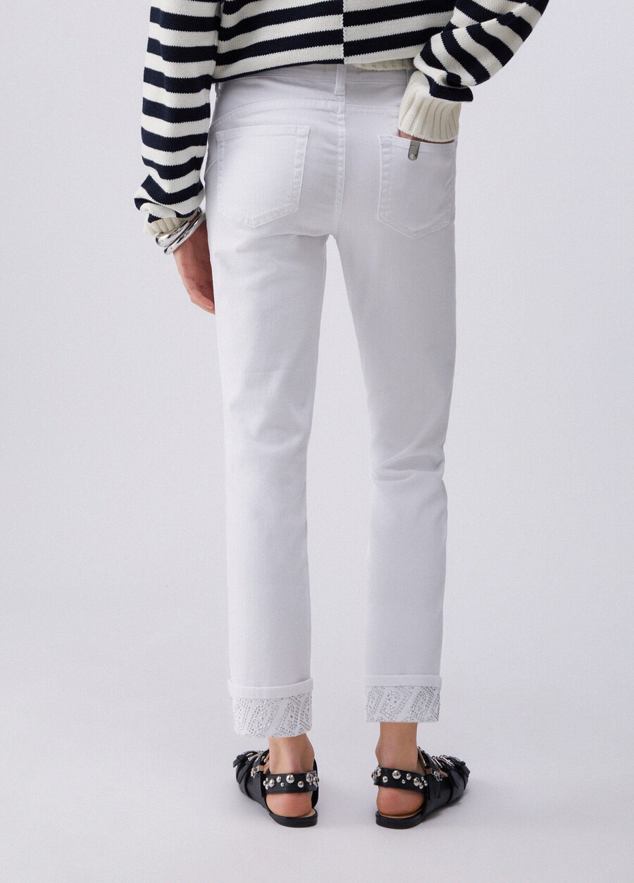 skinny trousers with turnups and gemstones