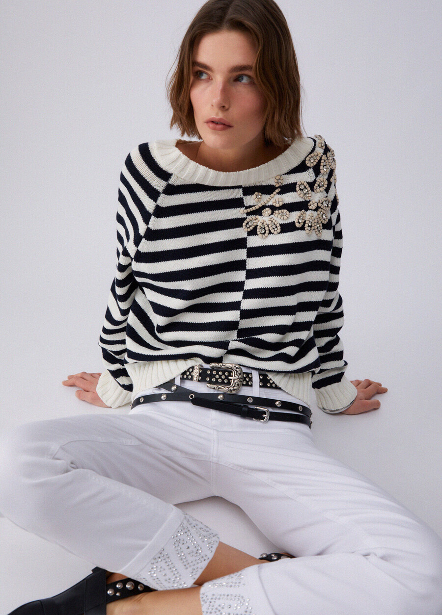 skinny trousers with turnups and gemstones