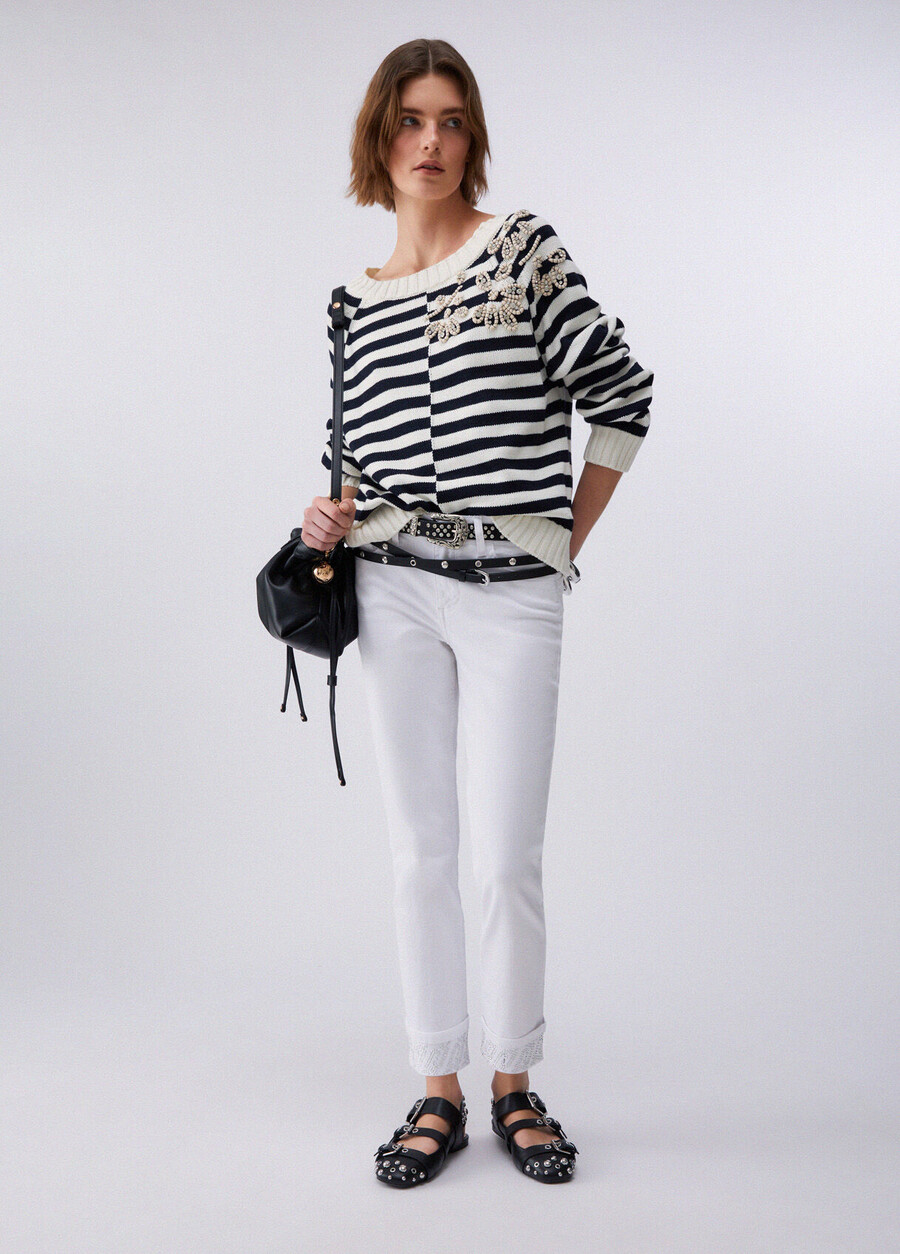skinny trousers with turnups and gemstones