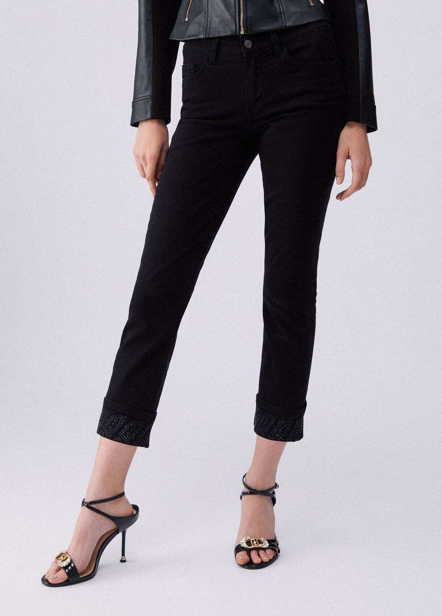 skinny trousers with turnups and gemstones